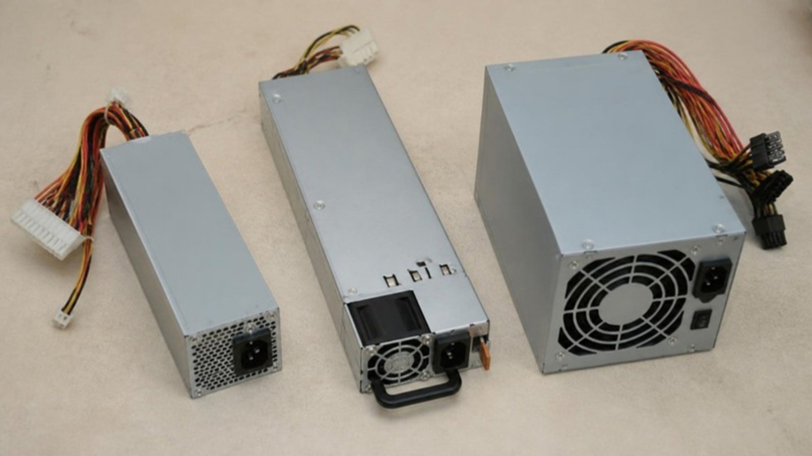 Slim desktop, rack server and tower workstation power supplies side by side